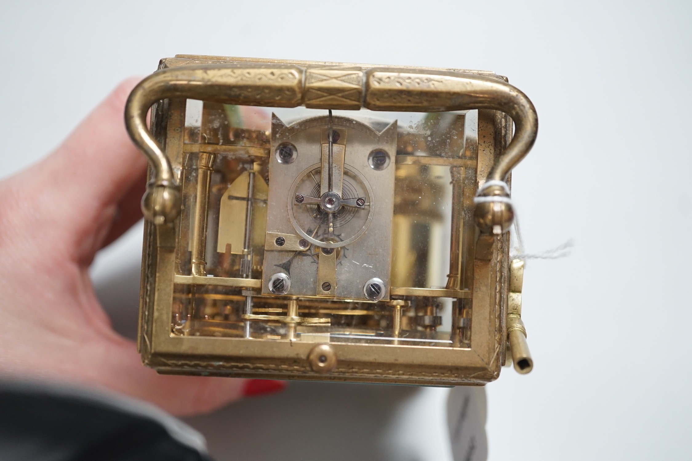 A 19th century French chased gilt brass hour-repeating carriage clock with black Roman dials and second spacers over a white dial, inscribed to movement plate Payne & Co, 163 New Bond Street, London